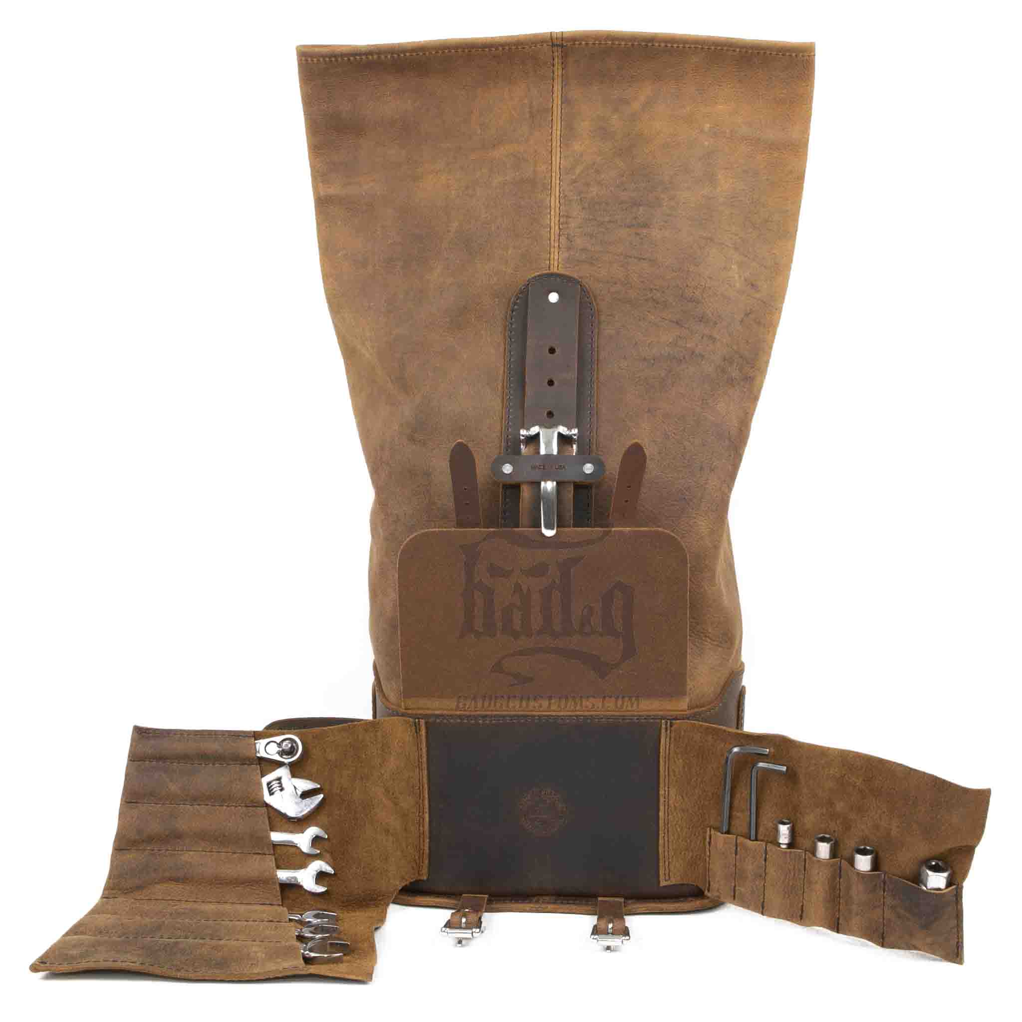 Upgrade your ride with the URB01 Rolltop Backpack Saddlebag. Unique design enables quick conversion from saddlebag to backpack. Hand crafted in USA with premium veg tan water buffalo leather and stainless steel hardware. Durable and stylish, it's the perfect fit for your motorcycle.